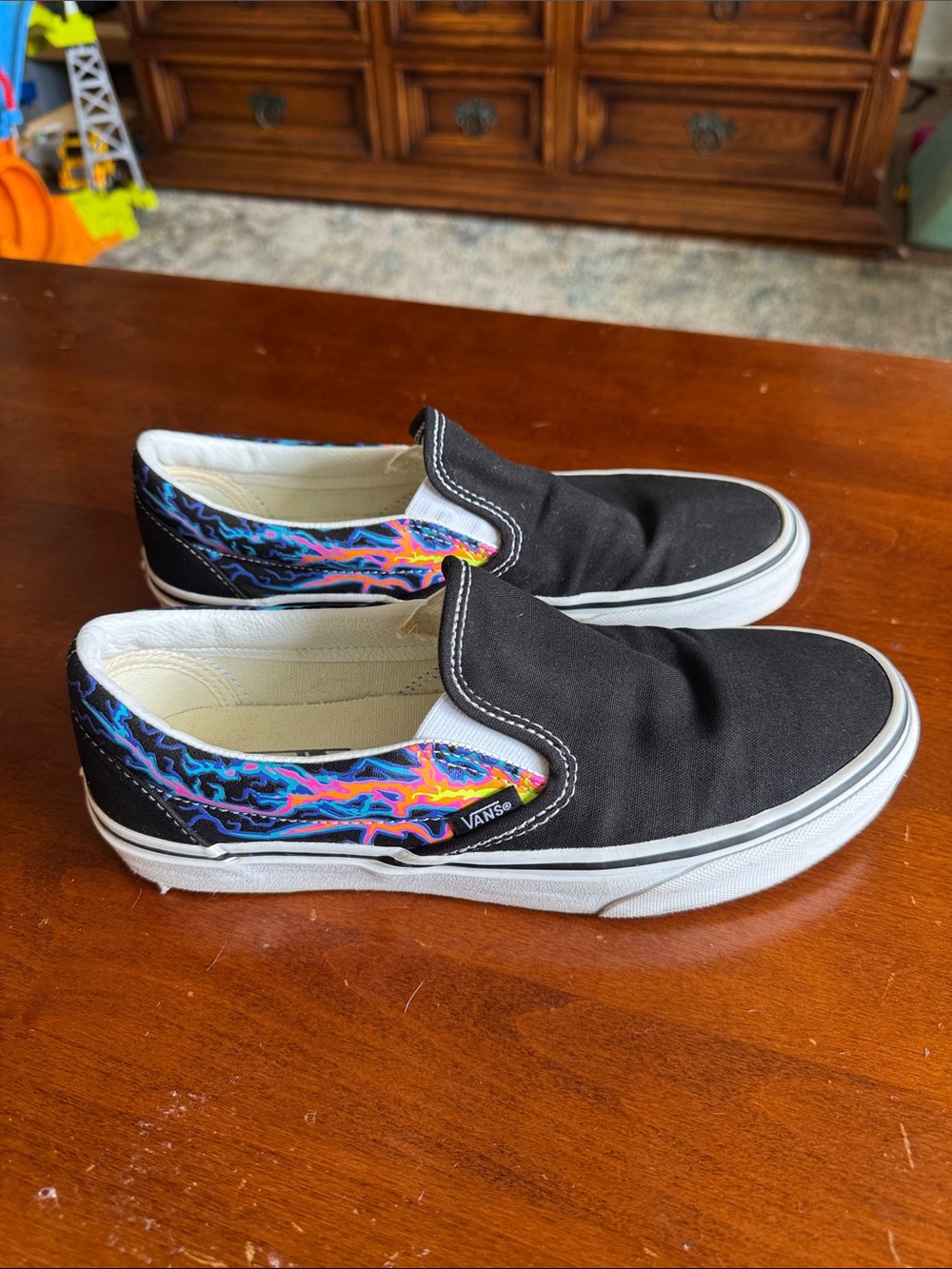 Vans Black Slip-On Sneakers with Multicolor Flame Print